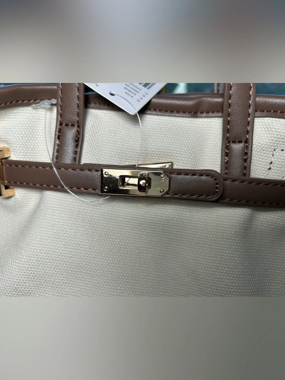 NWT🌷Anthropologie Cream Canvas Tote with Brown Trim and Gold Lock Hardware